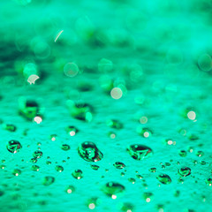 abstract green background with water drops, shallow depth of field