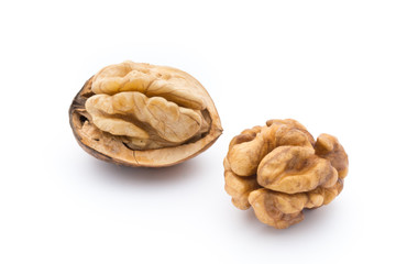 Walnut and walnut kernel isolated on the white background.