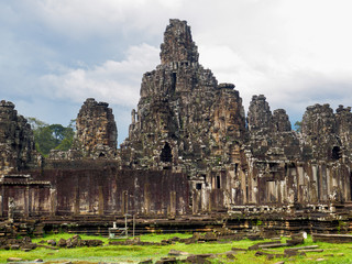 Fototapeta na wymiar Ancient Bayon Temple in Angkor Thom city complex, the 12th century city of Khmer Empire