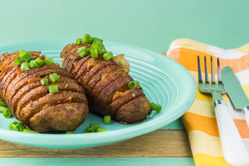 Hasselback potatoes with smoked paprika and bacon.