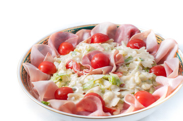 Pasta salad with vegetables on a plate