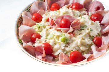 Pasta salad with vegetables on a plate