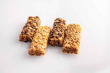 Cereal bars with chocolate isolated on white background.