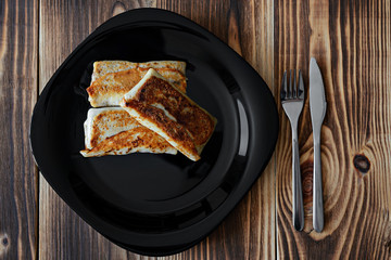rolled pancakes on a plate