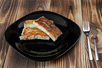 rolled pancakes on a plate