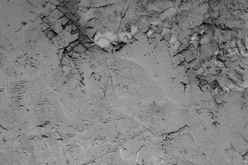Wall fragment with scratches and cracks