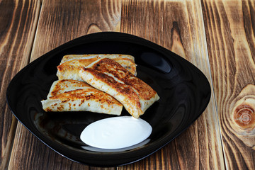 rolled pancakes on a plate