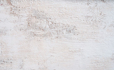 White whitewashed wall. Hight resolution texture. Grungy Shabby Uneven Painted Plaster In Whiten Facade. Web banner