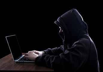 Anonymous hacker in the dark