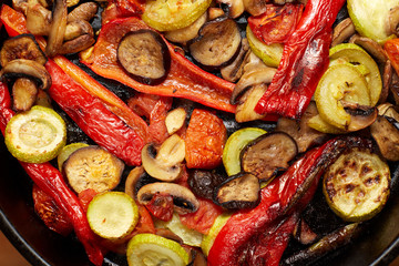 baked or grilled vegetables mushrooms and red paprika, eggplant, vegetable marrow, tomato