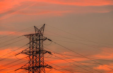Mobile tower silhouette with twilight evening sky.