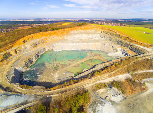Aerial view of a open cast mine. Industrial landscape. Heavy industry from above. 