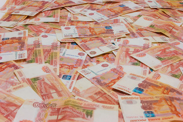 Heap of five thousand russian rubles banknotes