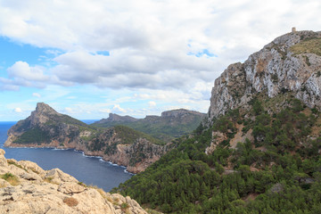 Fototapeta na wymiar Cap de Formentor cliff, Mediterranean Sea and Watchtower Talaia d'Albercutx, Majorca, Spain