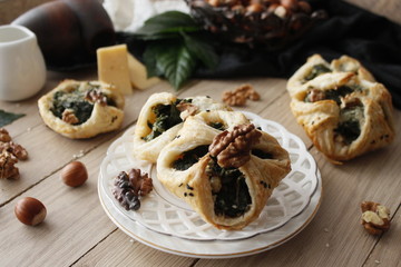 Spinach puffs with addition of cheese, walnuts and sesame seeds.Rustic style.