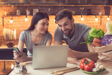 Young couple ordering food online