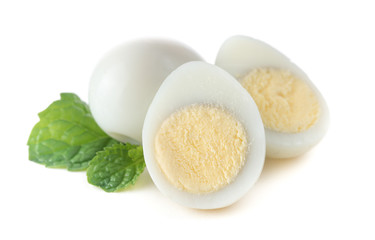 boiled quail eggs on white background