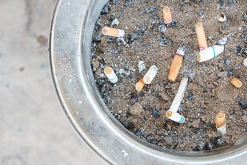 Picture is smoking in the park.