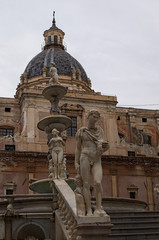 PALERMO, ITALY–03 January 2017: One of the main attractions of city - Praetorian Fountain (Fontana Pretoria). Amazing beauty of sculpture adorn the fountain