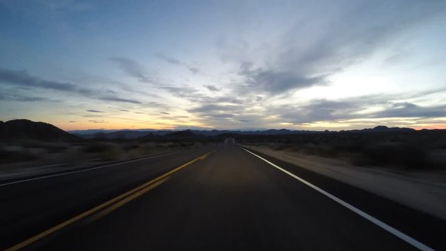Mojave desert dusk driving time lapse on Kelbaker and Interstate 40 in Southern California.  