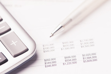 Financial paper charts and graphs on the table