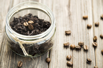 coffee body scrub with olive and coconut oils. homemade cosmetics.