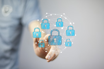 Businessman using digital padlock to secure