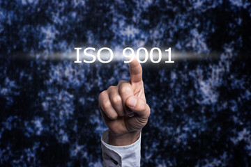 Hand holding a ISO 9001 Concept