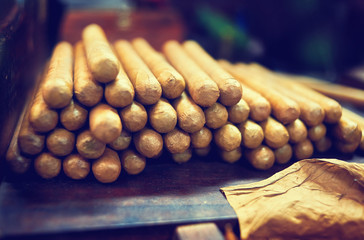 Fototapeta na wymiar Stock of handmade cigars.Traditional manufacture of cigars. Dominican Republic