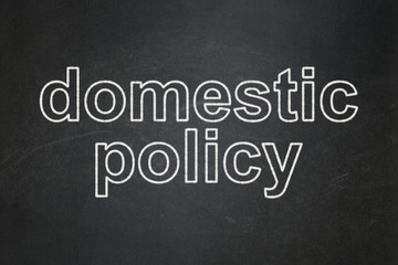 Obraz premium Politics concept: Domestic Policy on chalkboard background