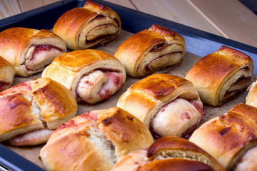 Fresh and Fragrant Cinnamon Buns and Raspberry Jam.