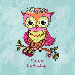 Cute colorful cartoon owl sitting on tree branch