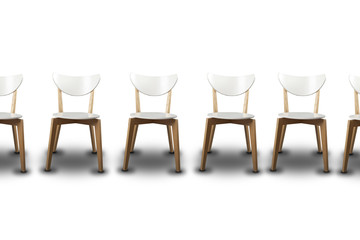 Row of white chairs isolated in white background