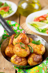Roasted baby potatoes with butter, salt and chives