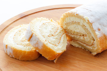 Homemade sponge roll with cottage cheese cream 