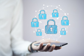 businessman hand showing phone with lock icon on screen