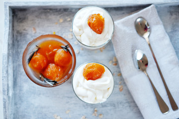 Oats layered with spicy apricot jam. Healthy food concept.