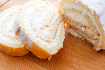 Homemade sponge roll with cottage cheese cream 