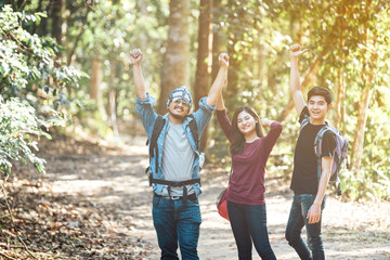 Asian traveler with friends, Group backpacks young walking together and looking happy