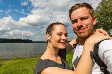 Naklejka premium Couple at the Orava Barrier Lake in Slovakia