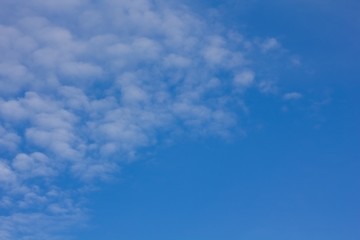 Pure blue sky with clouds.