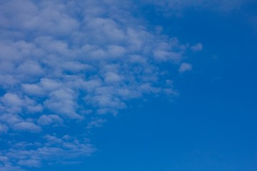 Pure blue sky with clouds.