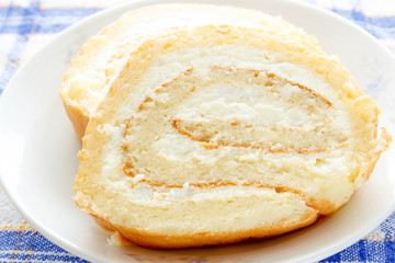 Homemade sponge roll with cottage cheese cream 