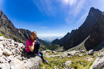 Naklejka na ściany i meble Girl hiking to the Teryho Chata in the Slovakian mountains