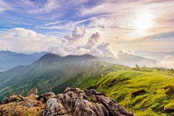 Beautiful landscape nature of high mountain cloud fog and sky on Phi Pan Nam Range during sunset in winter from viewpoint Phu Chi Fa Forest Park at Chiang Rai Province Thailand