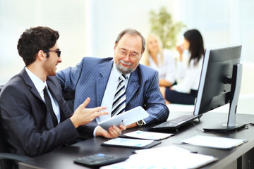 Fototapeta premium two businessmen discuss the company's financial plan