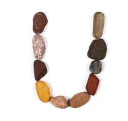 letter u from stone isolated on white © dule964