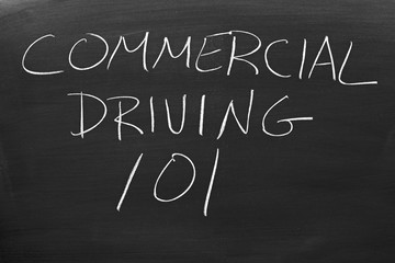 The words "Commercial Driving 101" on a blackboard in chalk