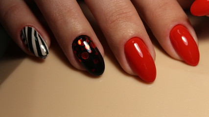 Manicure, nail design red abstraction