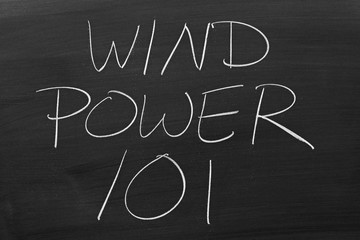 The words "Wind Power 101" on a blackboard in chalk